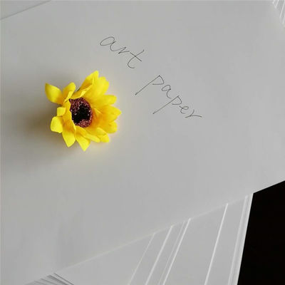 Papel de arte C2S anti-curl HI-cote confiável pelos fabricantes de celulose química-mecânica